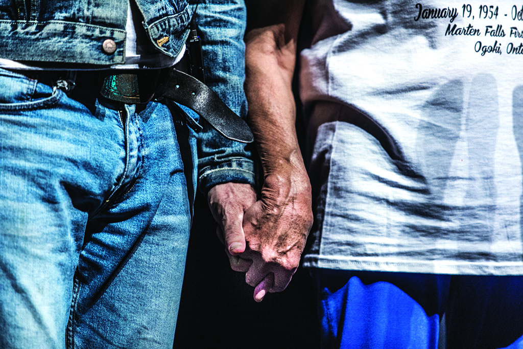 Holding hands in solidarity