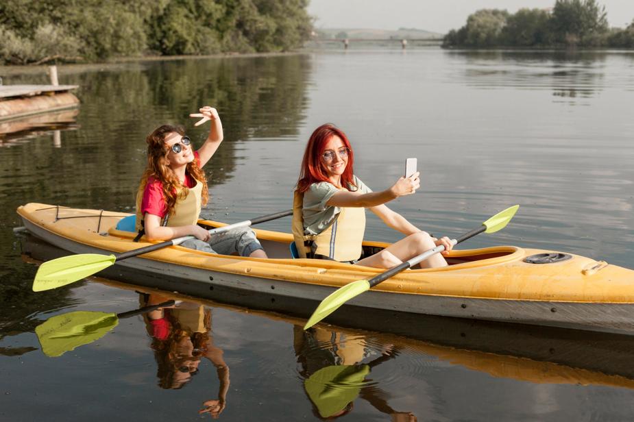 Two women kayaking on Centre Island in Toronto
