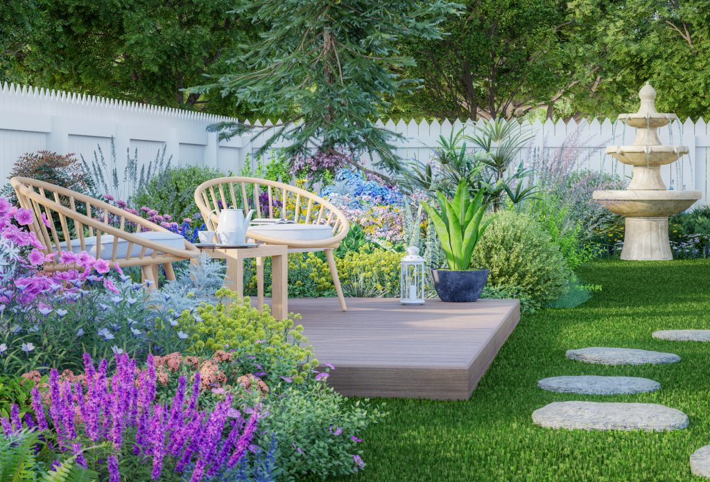 Wooden chairs on the plank terrace in the luxury colorful backyard garden 3d render with green lawn vareity color of flowers and white wood fence with morning sunlight